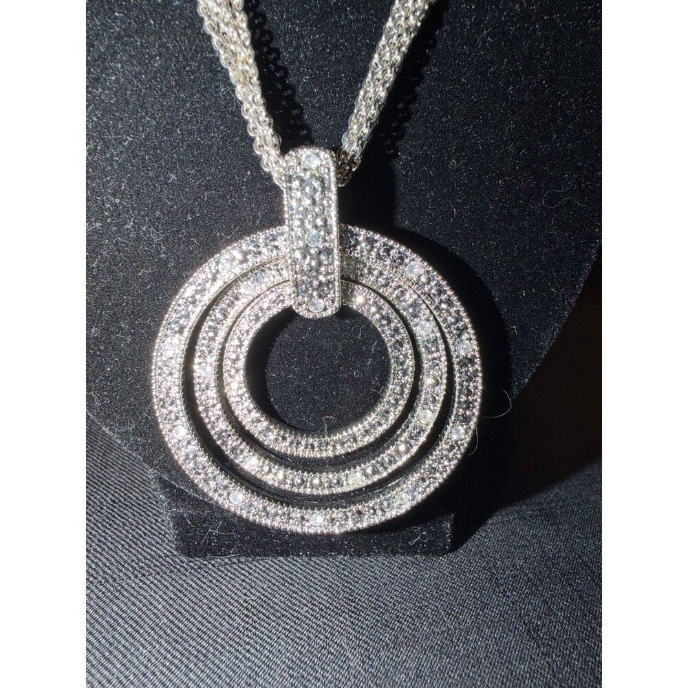 Pendant three concentric circles crystal stones multi-strand silver tone chain